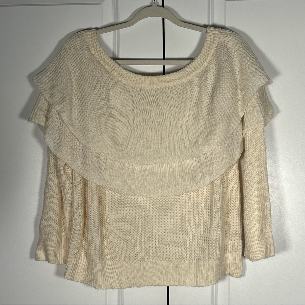 Cream Knit Sweater With Layered Ruffle Design Across Chest And Shoulders